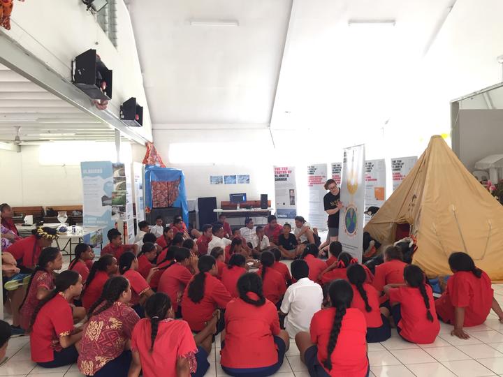 Children in Rarotonga hear about climate change.