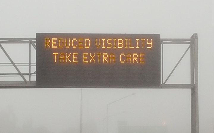 A sign on an Auckland motorway warning motorists to take care in foggy conditions.