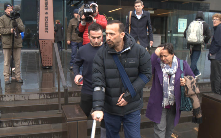 Mosque attack families exit court after the man charged pleaded not guilty to all charges. 