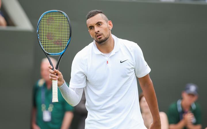 Nick Kyrgios of Australia reacts to the fans at Wimbledon.
