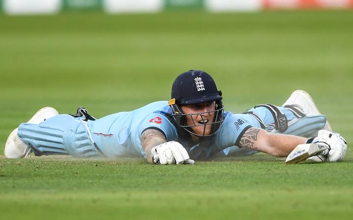 Ben Stokes dives to make his ground during the final.
