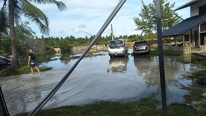 Tarawa street scene with king tide, Friday 30 August 2019.