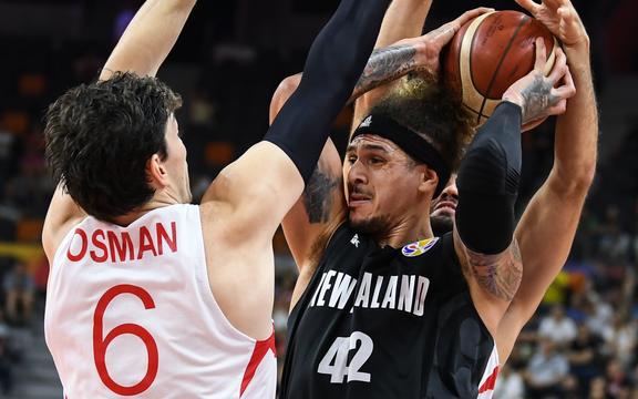 Issac Fotu (C) of New Zealand competes during the match between Turkey and New Zealand at the 2019 FIBA World Cup in Dongguan.