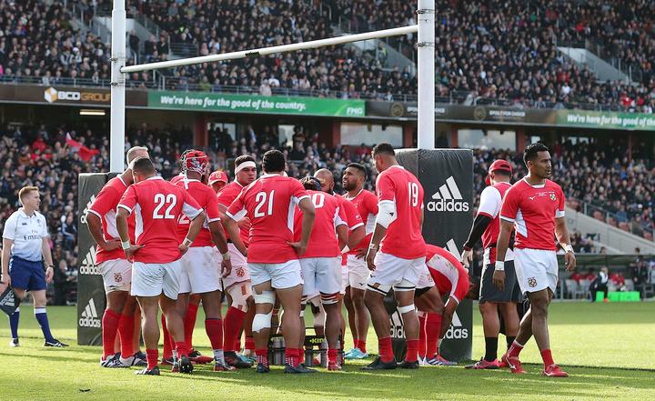 Tonga regroup under their posts after one of the 14 tries they conceded against the All Blacks in Hamilton.