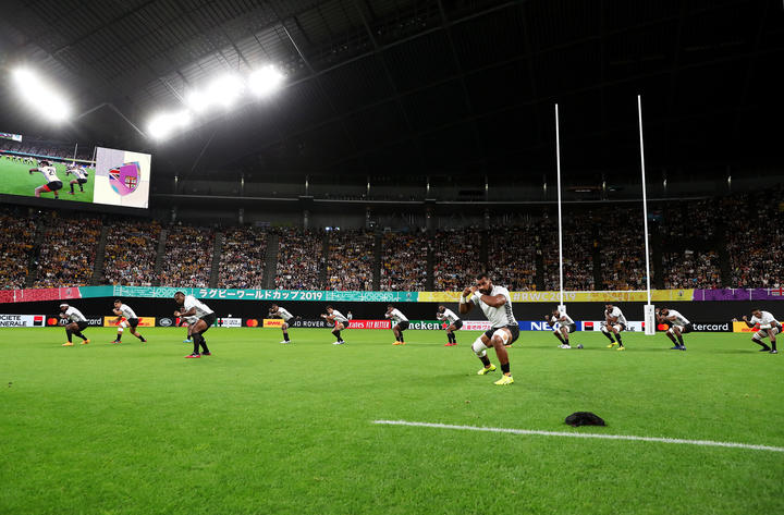 Fiji players perform the Cibi prior to their Rugby World Cup opener against Australia in Sapporo.