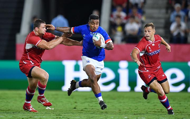 Samoan rugby player Rey Lee-Lo in action against Russia.