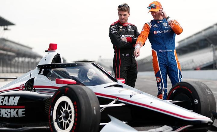 Scott Dixon (right) and Will Power look over the new aeroscreen which is being introduced for all Indycars.