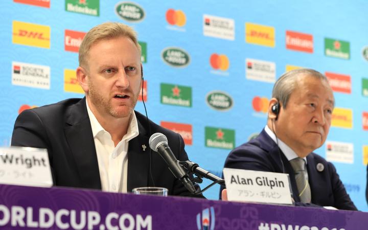 Rugby World Cup tournament director Alan Gilpin (L).