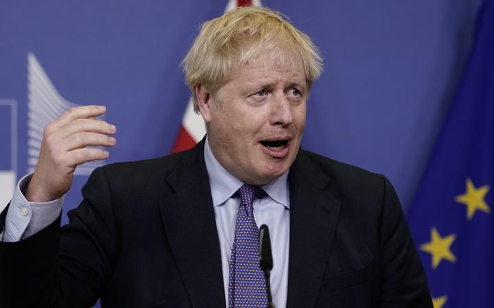 British Prime Minister Boris Johnson addresses a press conference alongside President of the European Commission (not pictured) at a European Union Summit at European Union Headquarters in Brussels on October 17, 2019. 