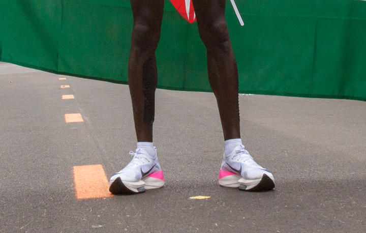 Eliud Kipchoge stands after the marathon record. 