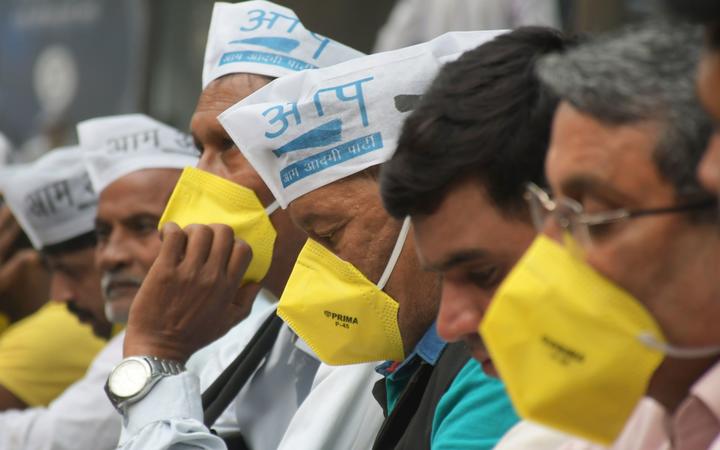 Members of Aam Aadmi Party (AAP) staging a protest against the stubble burning in Punjab and Haryana at Haryana Bhawan in New Delhi on October 31, 2019. 