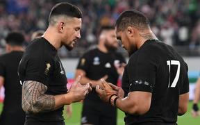 Sonny Bill Williams and Ofa Tuungafasi take a moment to pray after the All Blacks quarter final win over Ireland.