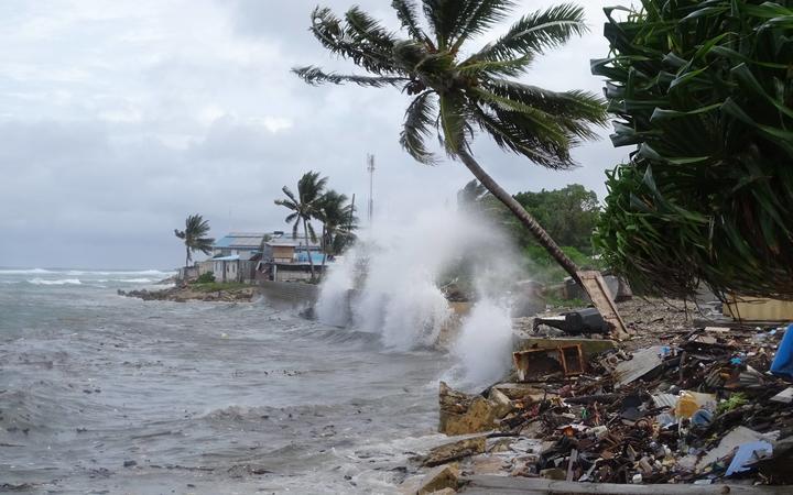 Waves crash into the Uliga back road sea wall in the Marshall Islands, 27-11-19.