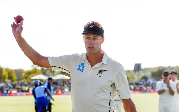 Kyle Jamieson of the Black Caps leaves the field with the match ball after getting a 5 wicket bag against India, 2020.