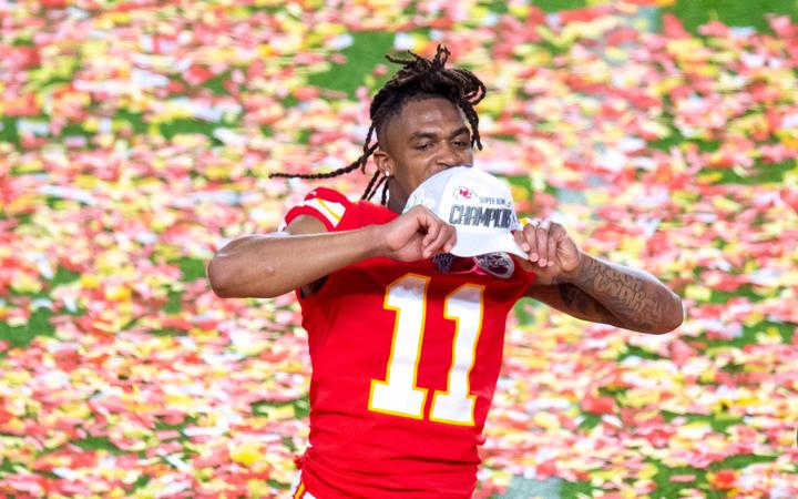 Kansas City Chiefs Wide Receiver Demarcus Robinson shows his Super Bowl Champions hat as he celebrates the Kansas City Chiefs winning the Super Bowl LIV game against the San Francisco 49ers.