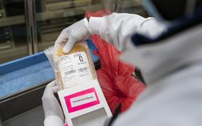 A lab technician freeze packs donated convalescent plasma donated by recovered COVID-19 patients for shipping to local hospitals at Inova Blood Services on April 22, 2020 in Dulles, Virginia. 