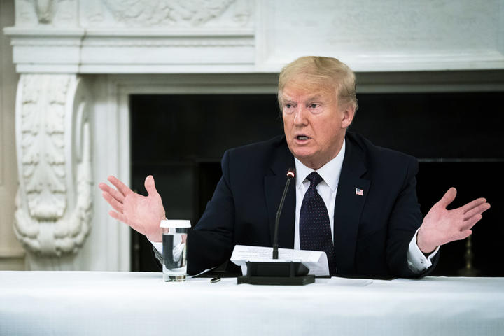 US President Donald Trump speaks during a roundtable in the State Dining Room of the White House on 18 May, 2020 in Washington, DC. 