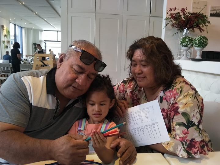 Tofiga and Lilian Su'a with their grandaughter