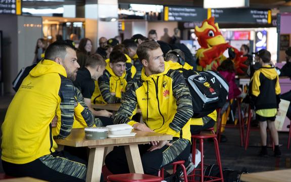 Wellington Phoenix players say goodbye to fans at Wellington airport.