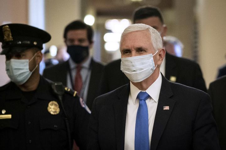 WASHINGTON, DC - MAY 19: Vice President Mike Pence wears a mask as he departs the office of Senate Majority Leader Mitch McConnell after meeting with him at the U.S. Capitol on May 19, 2020 in Washington, DC. 