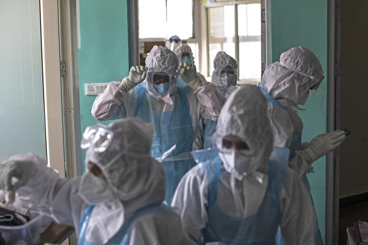 Doctors and nurses wearing Personal Protective Equipment (PPE) suits work at the Intensive Care Unit for Covid-19 coronavirus patients at the Sharda Hospital, India on July 15, 2020.