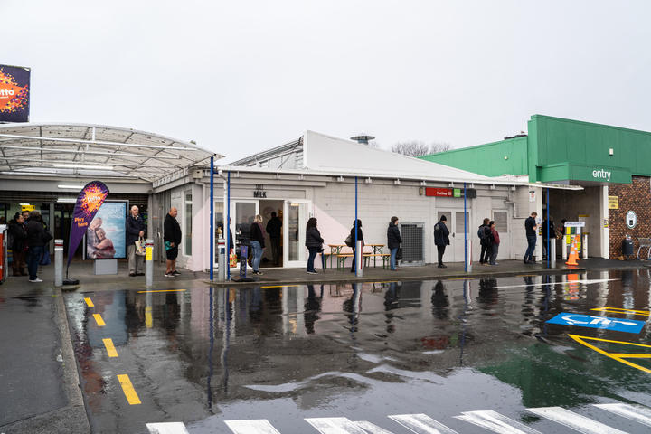 Shoppers queue to enter Point Chevalier Countdown in Auckland ahead of level 3 Covid-19 restrictions being imposed in the region at midday on 12 August 2020.