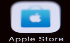  The Apple Store icon can be seen on a smartphone display.