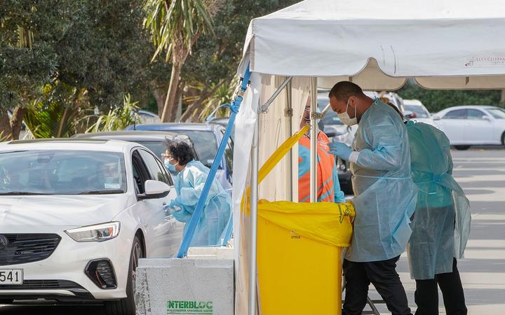 Testing being conducted by health workers at a COVID-19 testing station setup at Eden Park, National Sports Stadium, in Auckland on August 14, 2020. 