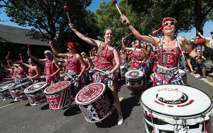 Drum band Batala performs along the streets of West London during the grand finale (Monday Parade) of the Notting Hill Carnival on 26 August, 2019 in London, England. 