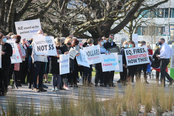 Protesters gather outside of the Canterbury Health Board corporate office on 20 August.
