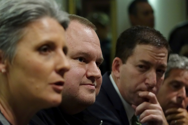 Laila Harre, Kim Dotcom and journalist Glenn Greenwald speak to reporters after the Moment of Truth event.