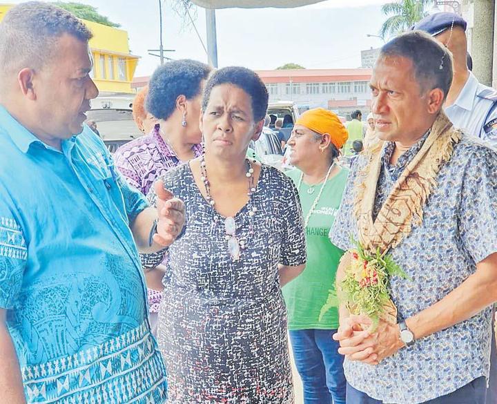 United Nations Pacific co-ordinator Sanaka Samarasinha (right) meets  members of the Market Vendors Association in western Viti Levu in Fiji.