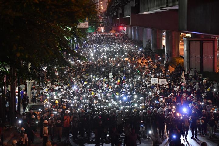 Pro-democracy protesters marching toward German embassy in Bangkok as they take part in a rally to anti Thai government on October 26, 2020 in Bangkok, Thailand.