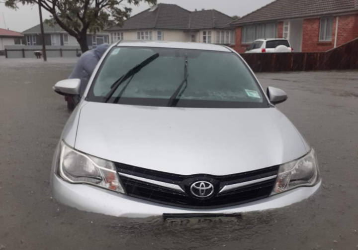 Teresa Vercoe didn't reach her beloved car in time to save it from rising floodwaters in Barker Road.