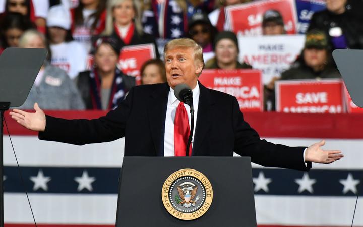 US President Donald Trump addresses the crowd with the Republican National Committee hosts a Victory Rally with Senator David Perdue and Senator Kelly Loeffler in Valdosta, GA United States on December 5, 2020.