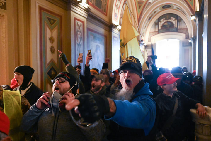 Rioters breached security and entered the Capitol as Congress debated the a 2020 presidential election Electoral Vote Certification.