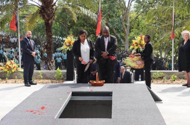 PNG Prime Minister James Marape and his wife Rachael Marape pay their respects at the final resting place of former PNG Prime Minister Sir Mekere Morauta whose son Dr James Morauta stands to the left and his wife Lady Roslyn Morata is on the far right. 8 January, 2020.
