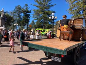 People dancing along to a piano tune by Marine Parade on Saturday to celebrate art deco without the festival.