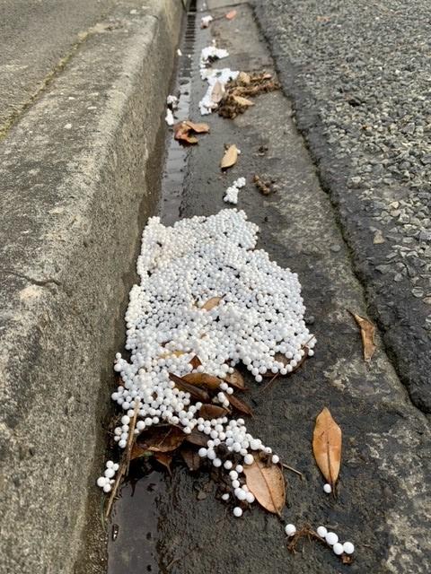 Polystyrene balls in a gutter in Owhiro Bay.