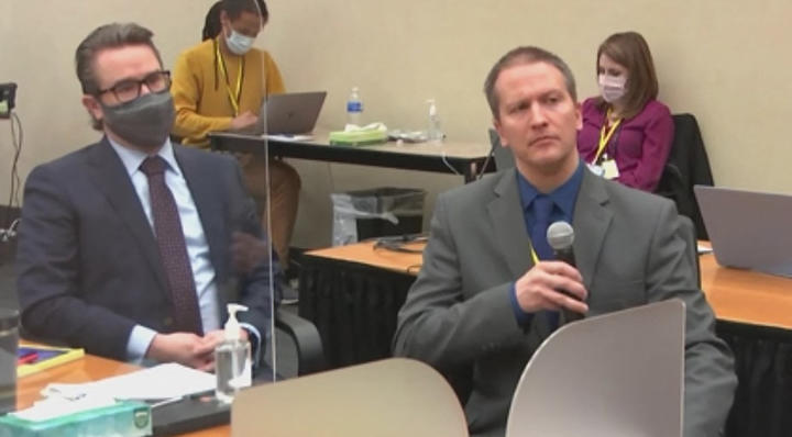 Former Minneapolis police officer Derek Chauvin, right, in court.