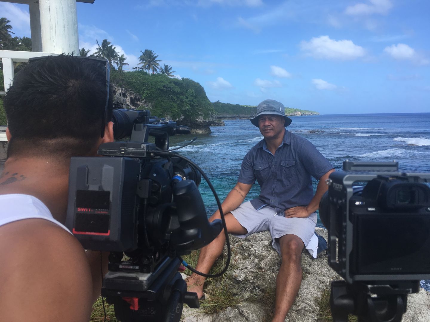 DOP Jack Tarrant, BTS shot of Shimpal Lelisi presenting to camera