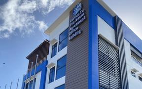 he newly completed four-story office building in Majuro was opened for business Thursday in Majuro