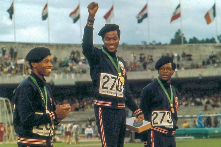 Lee Evans after winning gold in the 400m at the 1968 Mexico Olympics.