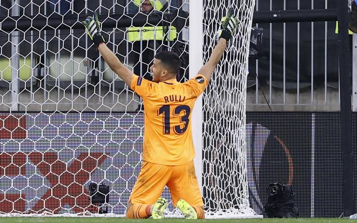 Villarreal's Argentine goalkeeper Geronimo Rulli reacts after deflecting a shot by Manchester United's Spanish goalkeeper David de Gea in the penalty shootout during the UEFA Europa League final football at the Gdansk Stadium on May 26, 2021. 