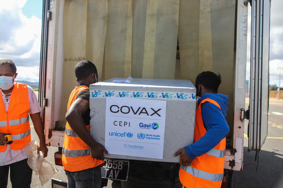 Workers load boxes of Oxford/AstraZeneca Covid-19 vaccines, part of the the Covax programme, into a truck after they arrived by plane at the Ivato International Airport in Antananarivo, Madagascar, on May 8, 2021. 