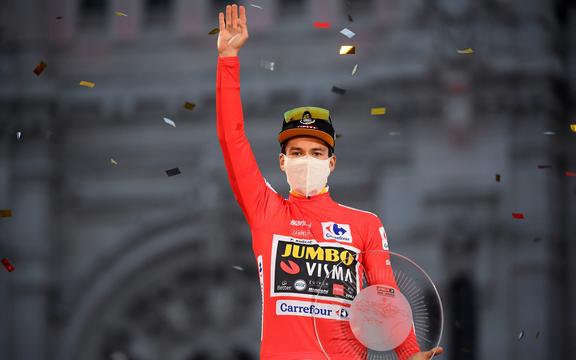 Team Jumbo's Slovenian rider Primoz Roglic celebrates on the podium after winning the 2020 La Vuelta cycling tour of Spain at the end of the 18th and final stage, a 124,2-km race from the Zarzuela racecourse to central Madrid, on November 8, 2020.