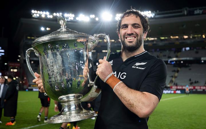 All Blacks captain Sam Whitelock holds the Bledisloe Cup after beating the Wallabies in the 2nd 2021 Bledisloe Cup Test rugby match at Eden Park - Auckland - New Zealand. 14 August 2021.