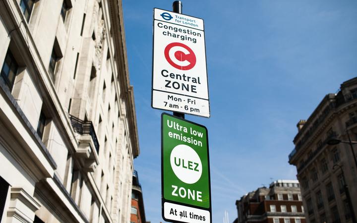 A sign for the recently-introduced Ultra Low Emission Zone (ULEZ) stands on Oxford Street in London, England, on April 15, 2019.