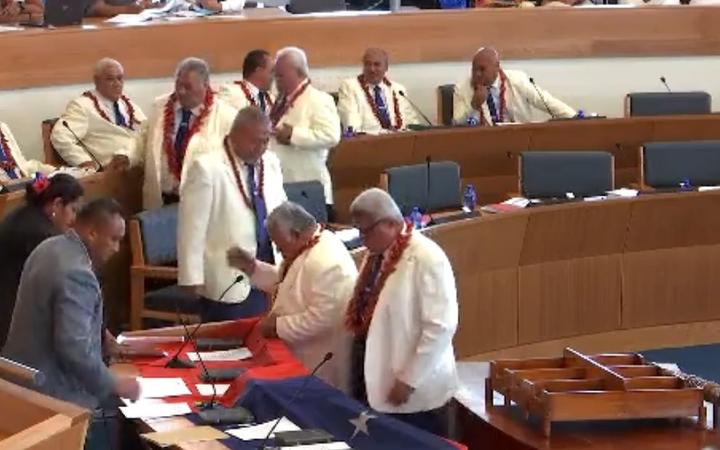 Leader of the HRPP, Tuilaepa Dr Sailele Malielegaoi, leads the swearing in of HRPP MPs in Parliament