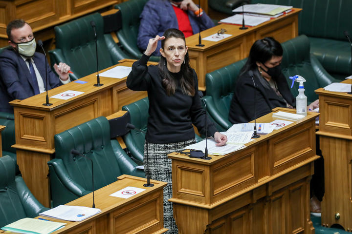 Jacinda Ardern answering a question in the House